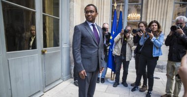 Newly-appointed French Education Minister Pap Ndiaye poses for photographs after the handover ceremony, amid attacks by far-right former presidential hopefuls, Paris, France, May 21, 2022. (EPA Photo)