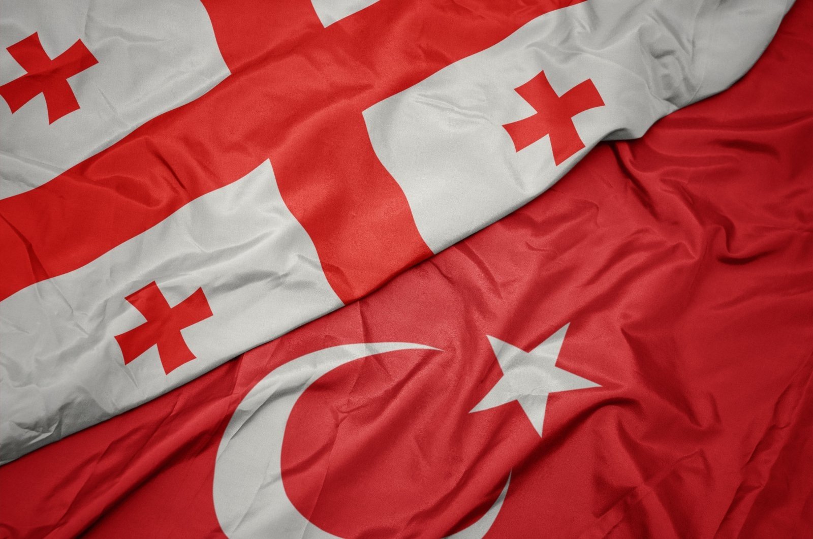 Flags of Georgia (L) and Turkey in this undated file photo. (Shutterstock Photo)