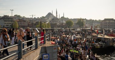 People walk in Eminönü quarter, in Istanbul, Turkey, May 14, 2022. (REUTERS PHOTO) 