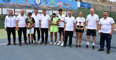 Winners and dignitaries pose for a photo on the final day of the Cudi Cup International Tennis Tournament, Şırnak, southeastern Turkey, May 22, 2022. (AA Photo)