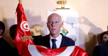  Tunisian presidential candidate Kais Saied reacts after exit poll results were announced in a second-round runoff of the presidential election in Tunis, Tunisia Oct.13, 2019. (Reuters File Photo)