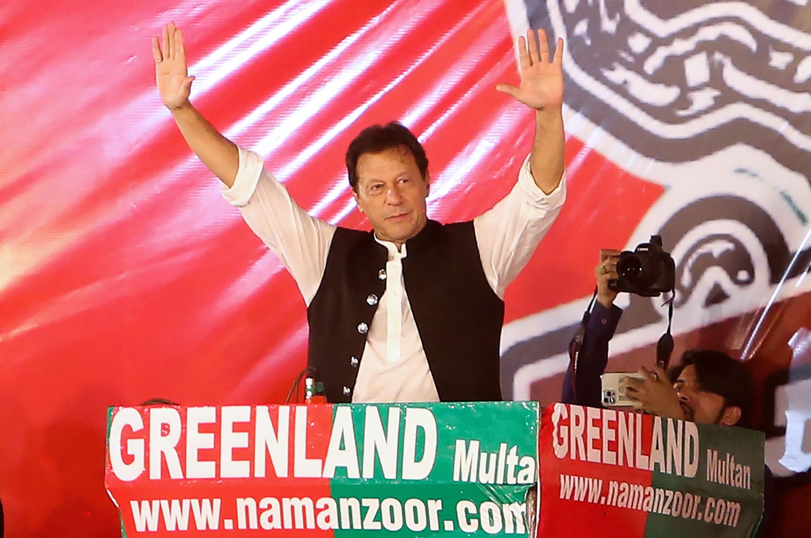 Former Pakistan&#039;s Prime Minister Imran Khan gestures as he addresses supporters of the Pakistan Tehreek-e-Insaf (PTI) party during a rally in Multan, Pakistan, May 20, 2022. (AFP Photo)