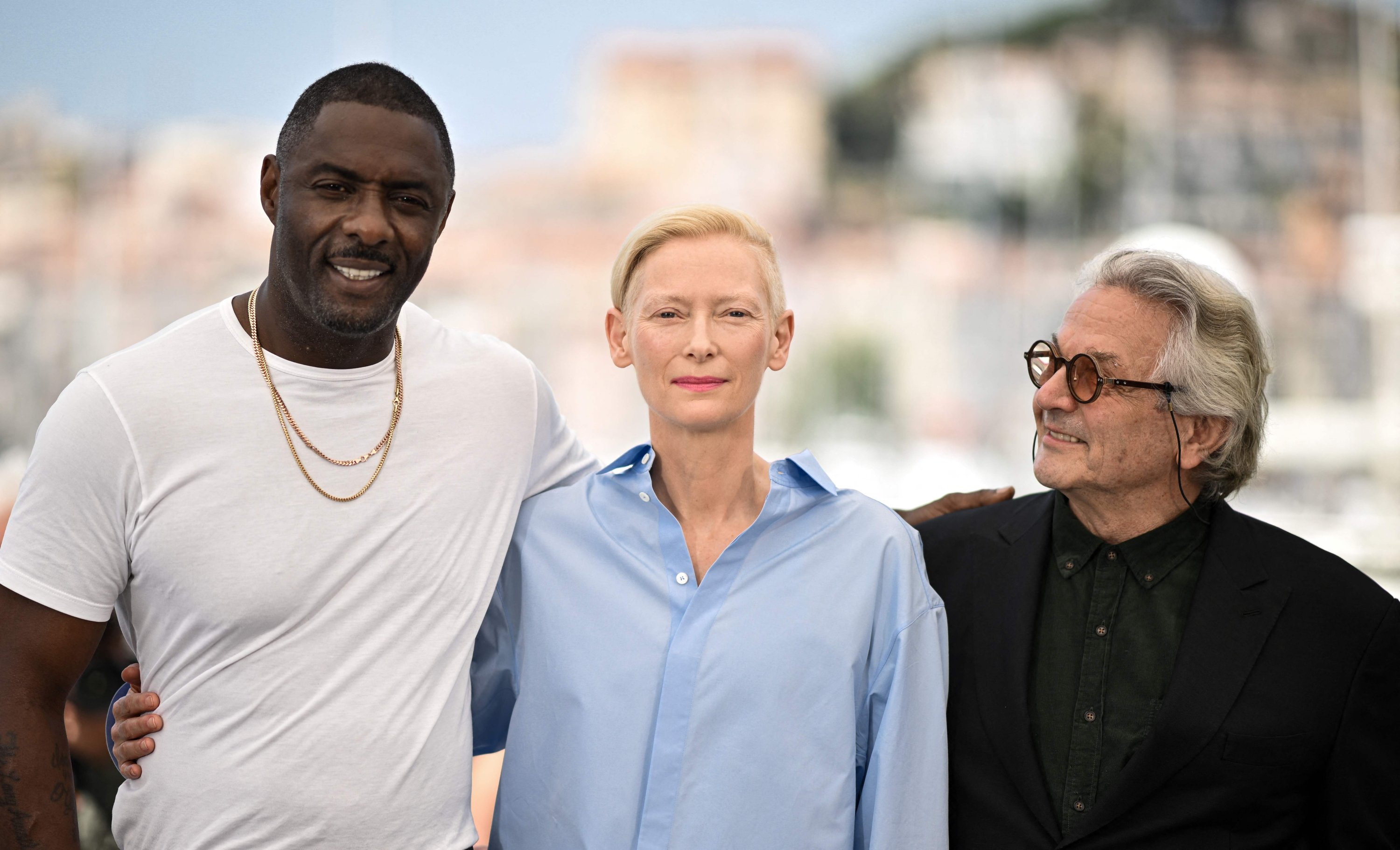 (From L) British actor Idris Elba, British actress Tilda Swinton and Australian director and screenwriter George Miller pose during a photocall for the film 