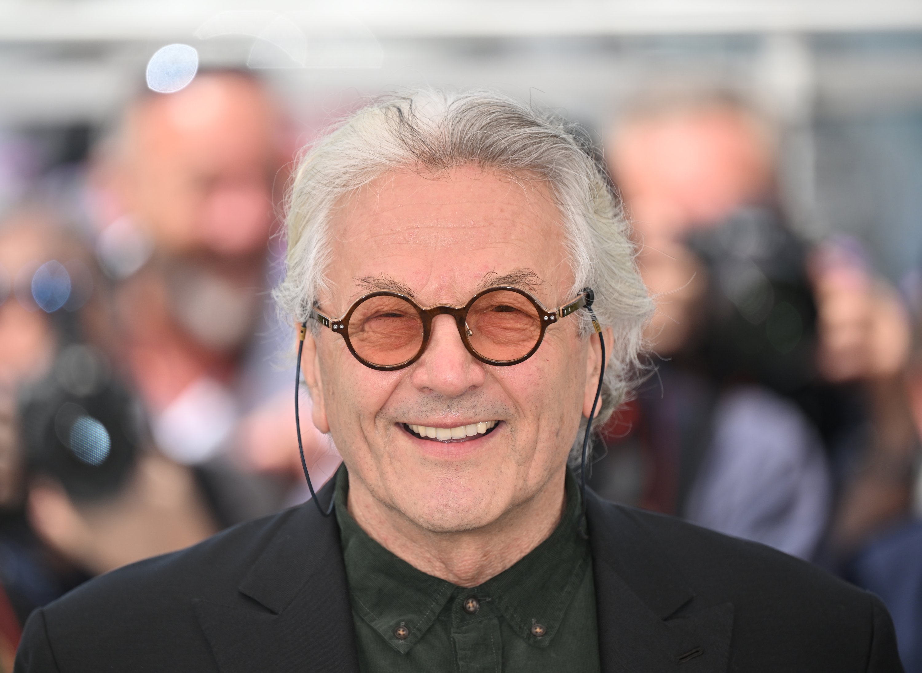 Director George Miller poses during a photocall for the film 