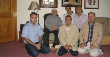 An undated photo published by AA shows Fetullah Gülen (2nd L) with Arif Erdem (3rd L) and former footballers Orhan Ak and Cihan Haspolatlı sitting next to Gülen. (AA PHOTO) 