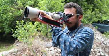 Emin Yoğurtcuoğlu, who started bird watching as a hobby at a young age and later continued professionally, added 14 new species to Turkey's bird inventory during his 23-year observation adventure. Yoğurtcuoğlu traveled every inch of Turkey, tracing new species, Hatay, Turkey, May 21, 2022. (AA Photo)