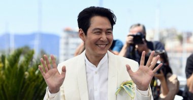 Lee Jung-jae poses for photographers at the photocall for the film "Hunt" at the 75th international film festival, Cannes, southern France, May 19, 2022. (Reuters Photo)