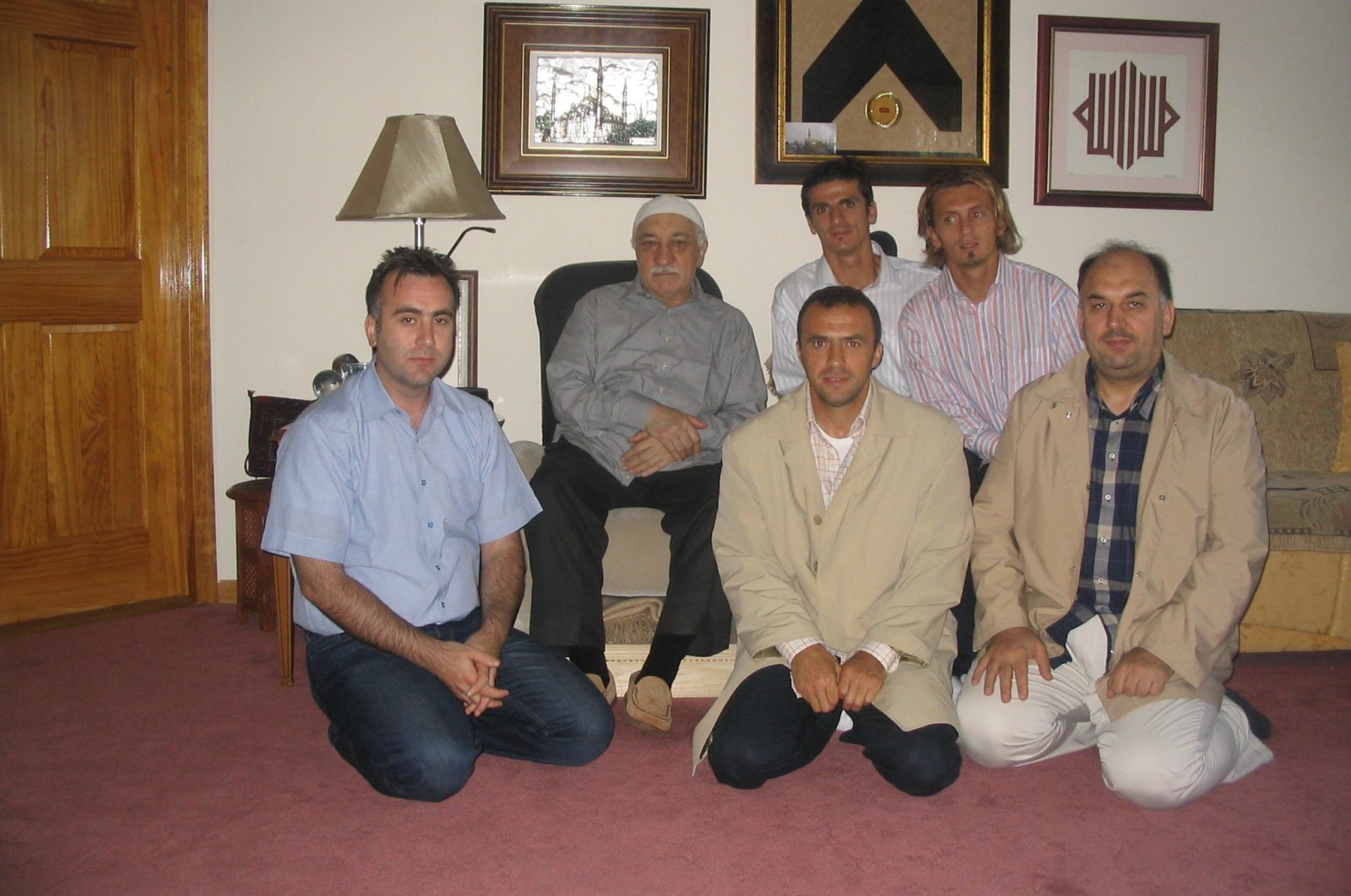 An undated photo published by AA shows Fetullah Gülen (2nd L) with Arif Erdem (3rd L) and former footballers Orhan Ak and Cihan Haspolatlı sitting next to Gülen. (AA PHOTO) 