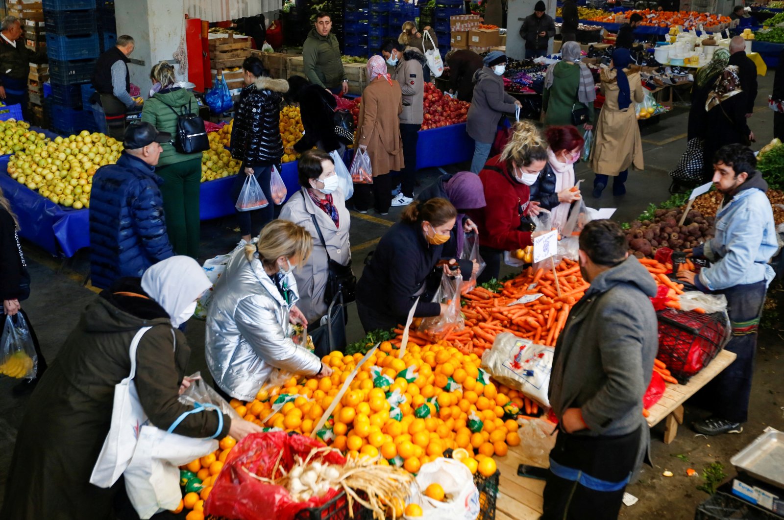 People shop at a fresh market in Istanbul, Turkey, Jan. 4, 2022. (Reuters Photo)