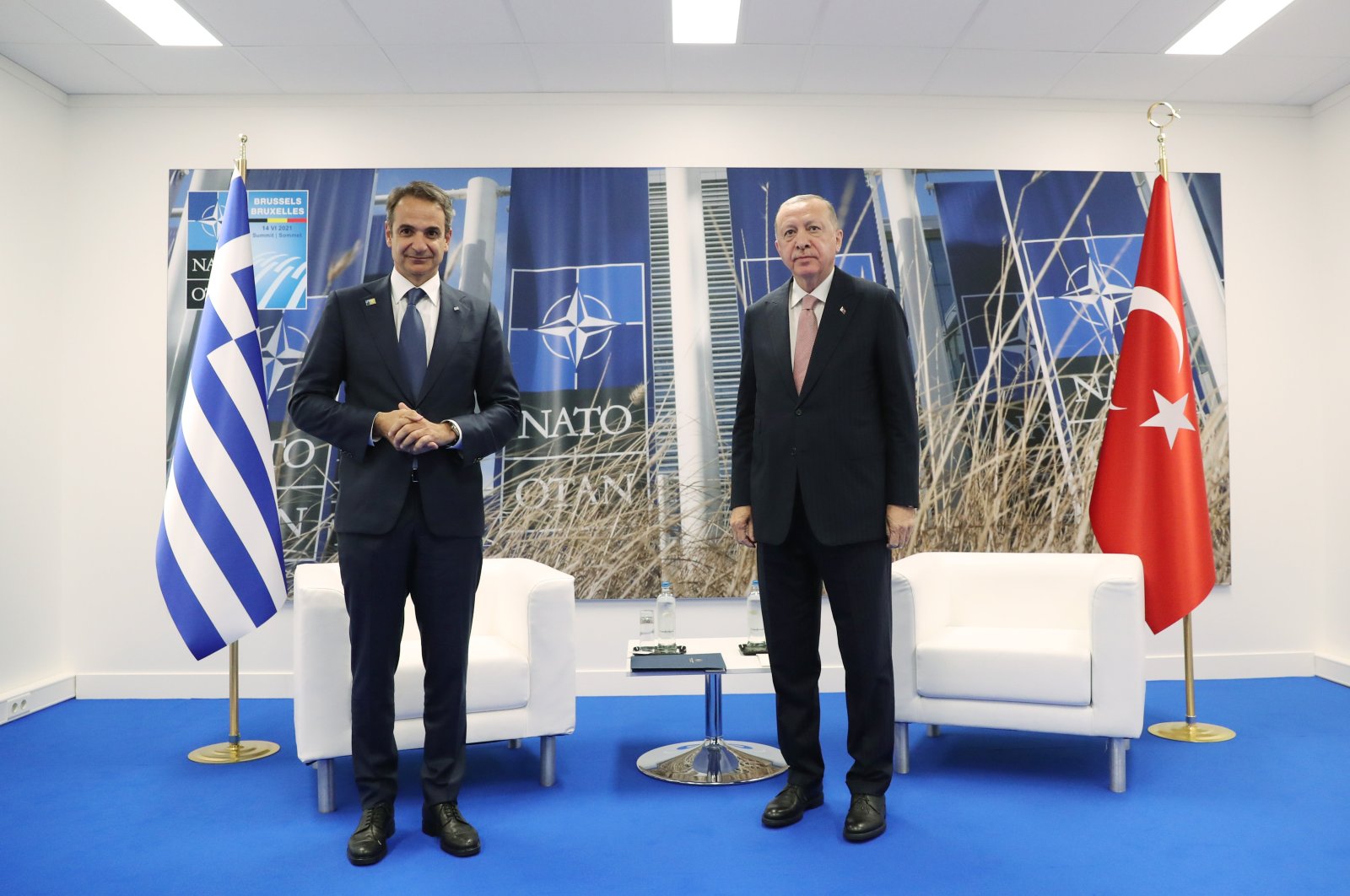 President Recep Tayyip Erdoğan (R) and Greek Prime Minister Kyriakos Mitsotakis pose for photos before their meeting on the sidelines of the NATO Leaders’ Summit in Brussels, Belgium, June 14, 2021. (AA Photo)