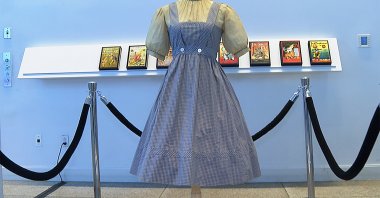 A blue and white checked gingham dress, worn by Judy Garland in the &quot;Wizard of Oz,&quot; hangs on display, at Bonhams in New York, U.S., April 25, 2022. (AP Photo)
