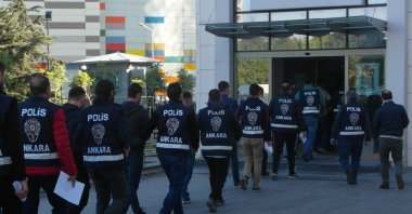 Police officers escort captured FETÖ suspects in the capital Ankara, Turkey, May 24, 2022. (İHA PHOTO) 