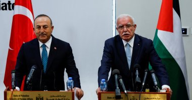 Foreign Minister Mevlüt Çavuşoğlu (L) and Palestinian Foreign Minister Riad al-Maliki attend a joint news conference, in Ramallah, in the Israeli-occupied West Bank, Palestine, May 24, 2022. (Reuters Photo)