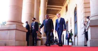 German Chancellor Olaf Scholz and South African President Cyril Ramaphosa arrive for a joint news conference during Scholz's state visit to the governments' Union building in Pretoria, South Africa, May 24, 2022. (Reuters Photo)