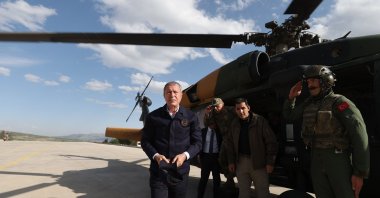 Minister of National Defense Hulusi Akar (L) arrives at the southern border after clashes with terrorists claim the lives of five Turkish soldiers, Turkey, May 24, 2022. (AA Photo)