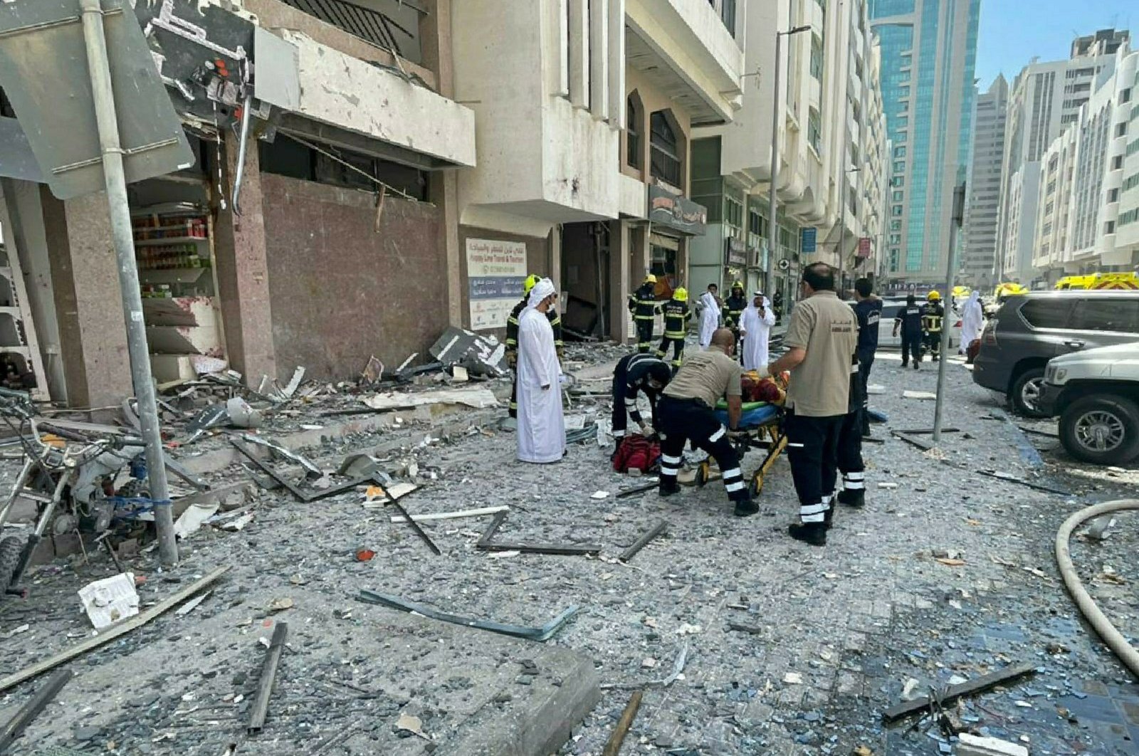 Debris covers the street after an explosion in the Khalidiya district of Abu Dhabi, UAE, May 23, 2022. (Abu Dhabi Police via AP)