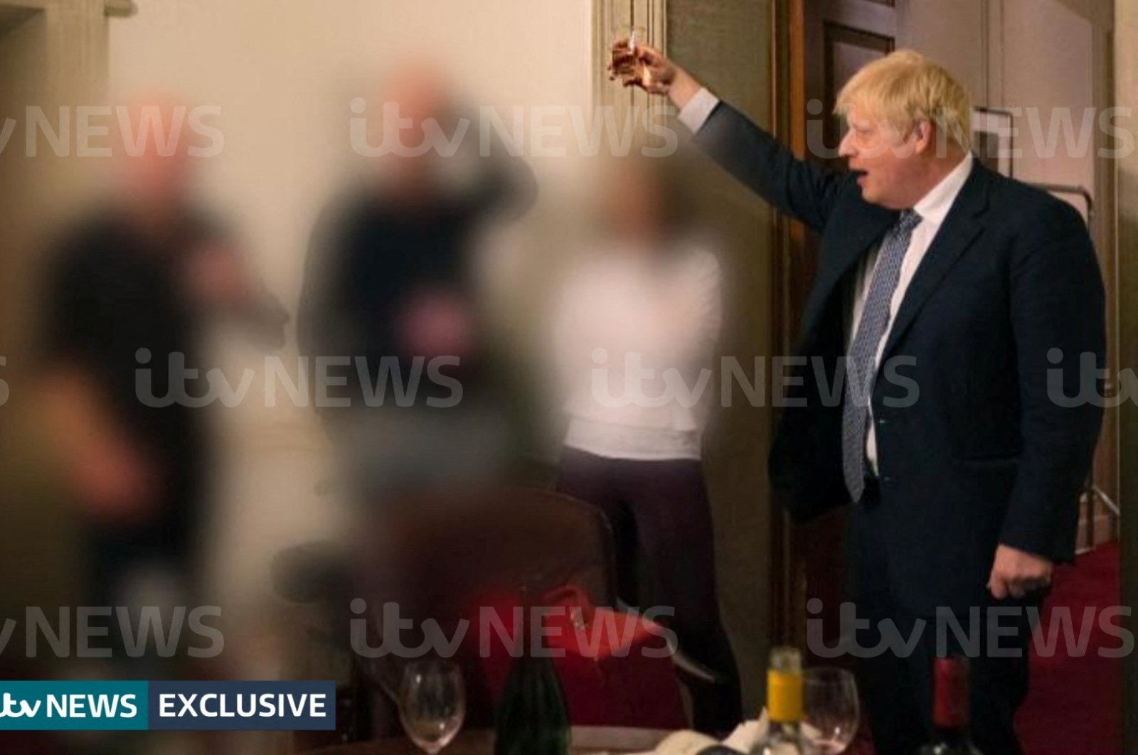 A handout picture shows British Prime Minister Boris Johnson raising a glass during a party at Downing Street amid the COVID-19 pandemic in London, U.K., Nov. 13, 2020. (ITV News via Reuters)