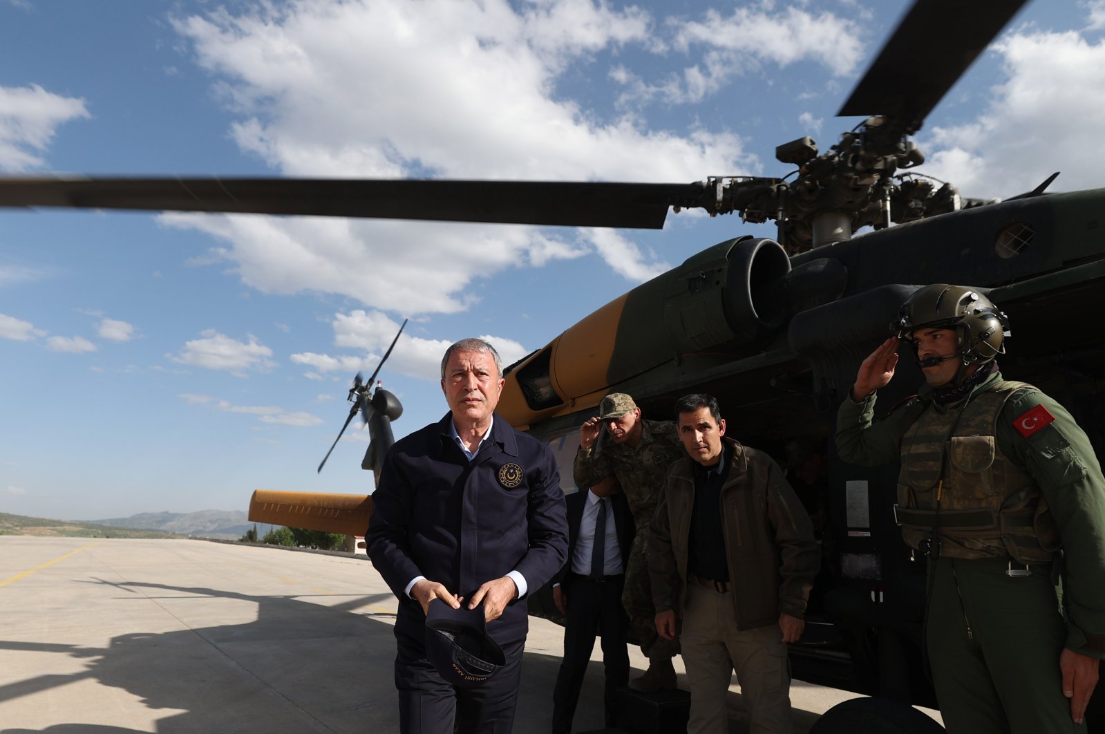 Minister of National Defense Hulusi Akar (L) arrives at the southern border after clashes with terrorists claim the lives of five Turkish soldiers, Turkey, May 24, 2022. (AA Photo)