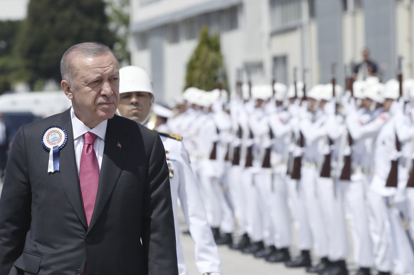 President Recep Tayyip Erdogan inspects a military honor guard during a ceremony marking the docking of the Hızır Reis and the first welding of the Selman Reis submarines, Kocaeli, Turkey, May 23, 2022. Erdogan, whose country has objected to Sweden and Finland joining NATO, called on Stockholm to take &quot;concrete steps&quot; that would alleviate Turkey&#039;s security concerns. (Turkish Presidency via AP Photo)
