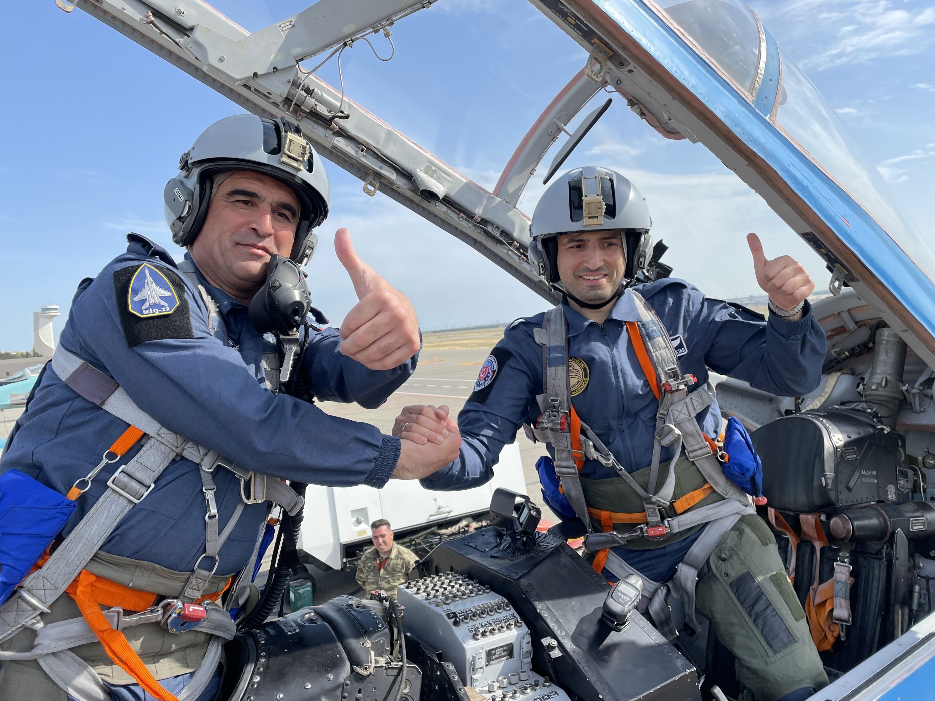 Air Pilot Col. Zaur Rustamov (L) and Selçuk Bayraktar pose for a souvenir photo, Teknofest, Azerbaijan, May 25, 2022. (AA Photo)