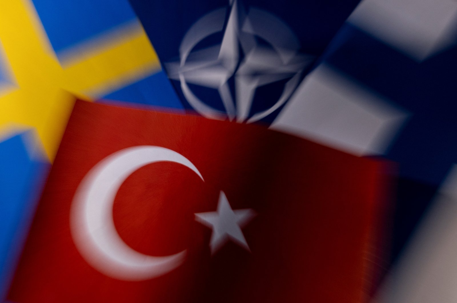 NATO, Turkish, Swedish and Finnish flags are seen in this illustration, May 18, 2022. (REUTERS Photo)
