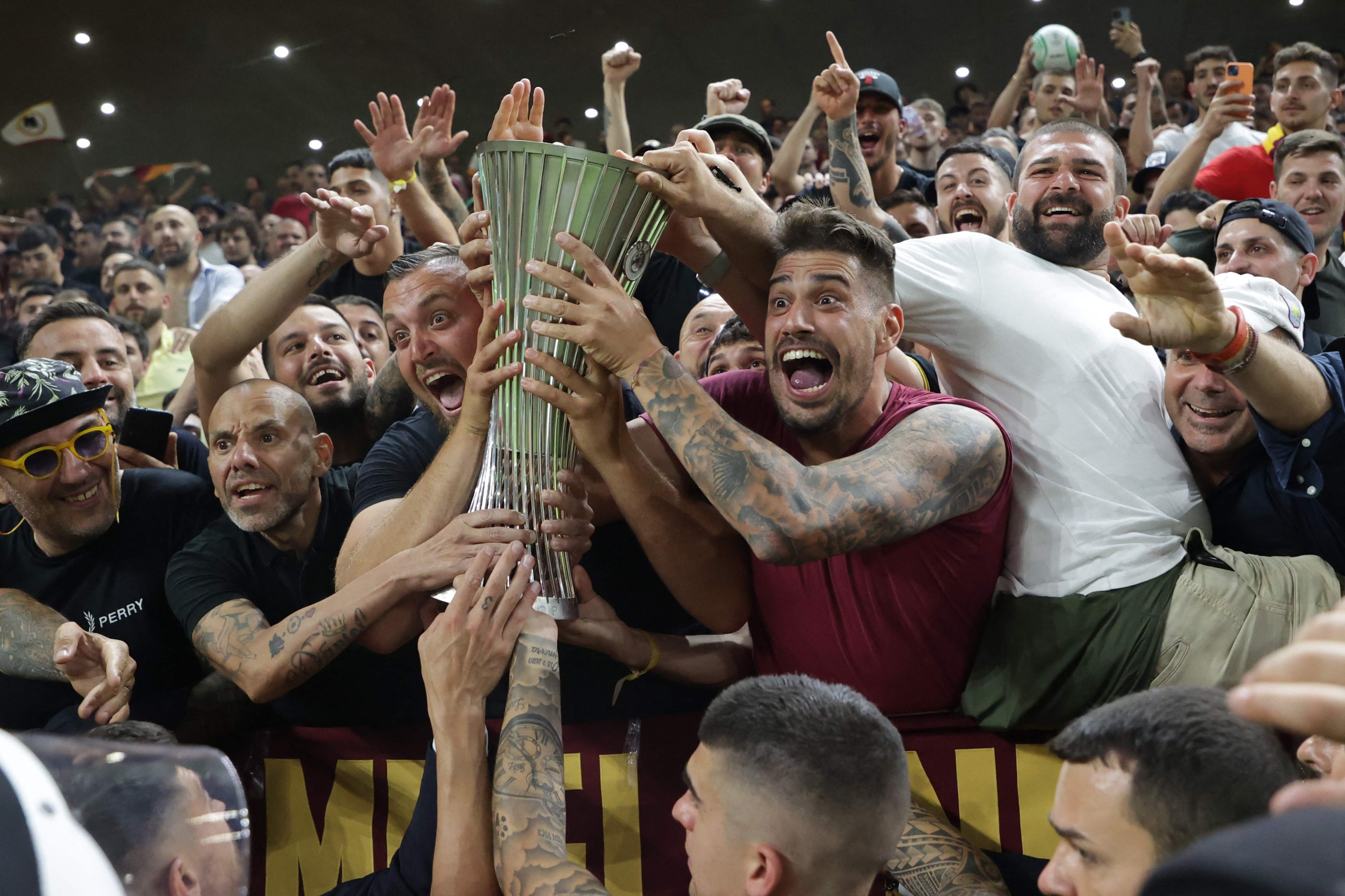 Roma players present the trophy to their fans after the UEFA Europa Conference League final against Feyenoord, Tirana, Albania, May 25, 2022. (AFP Photo)