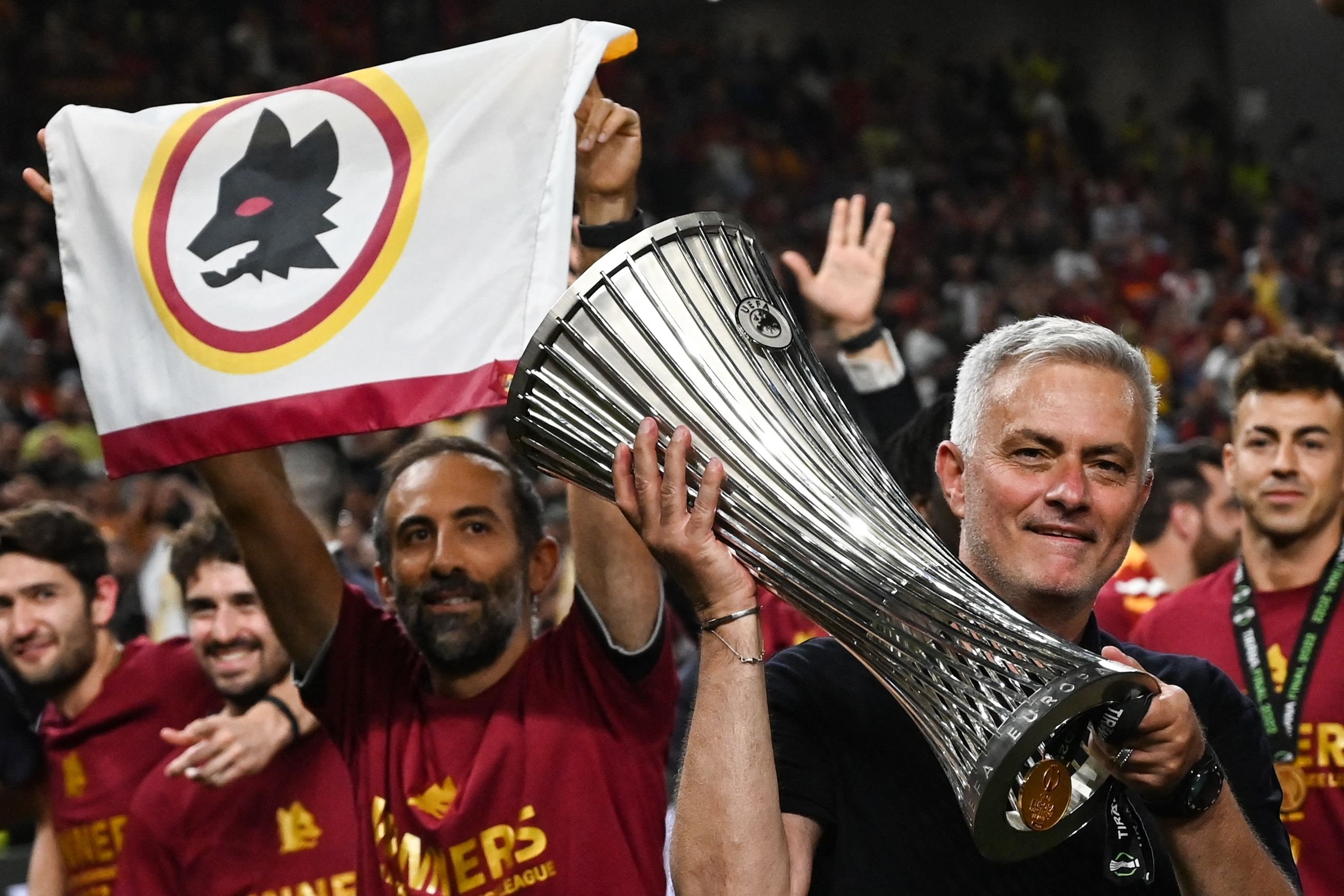 Roma's Portuguese head coach Jose Mourinho celebrates with the trophy after his team won the UEFA Europa Conference League final against Feyenoord, Tirana, Albania, May 25, 2022. (AFP Photo)