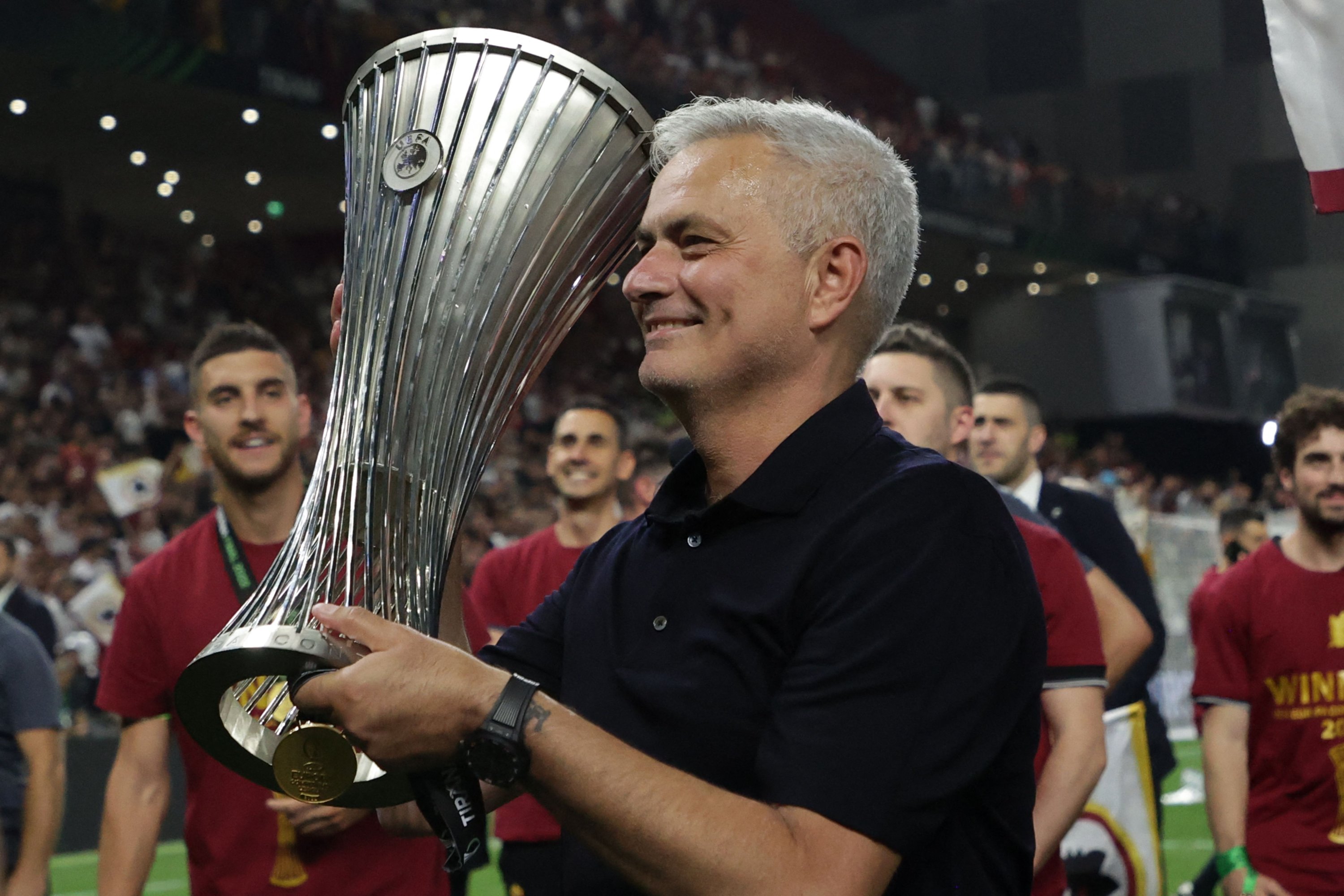 Roma coach Jose Mourinho with the trophy after winning the Europa Conference League final, Tirana, Albania, May 25, 2022. (AFP Photo)