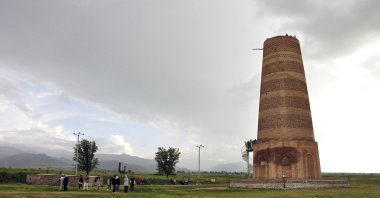 The round-shaped Burana Tower in Kyrgyzstan is frequently visited by local and foreign tourists for its history and architecture, Bishkek, Kyrgyzstan, May 25, 2022. (AA Photo)