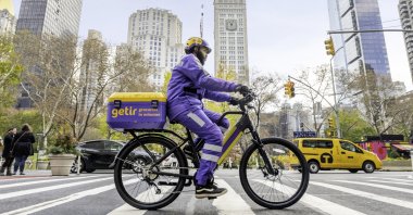 A Getir courier is seen on a street in New York, U.S., Dec. 8, 2021. (Courtesy of Getir)