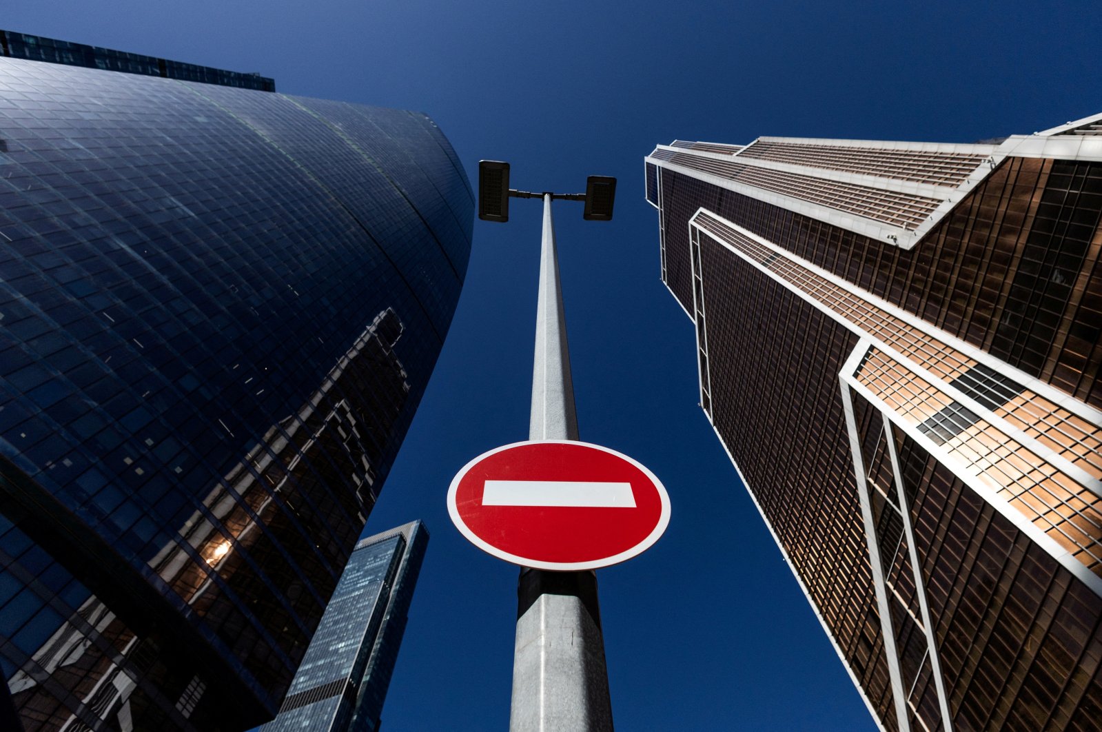 A stop road sign is seen next to skyscrapers at Moscow International business center, also known as "Moskva-City," in Moscow, Russia, April 14, 2022. (Reuters Photo)