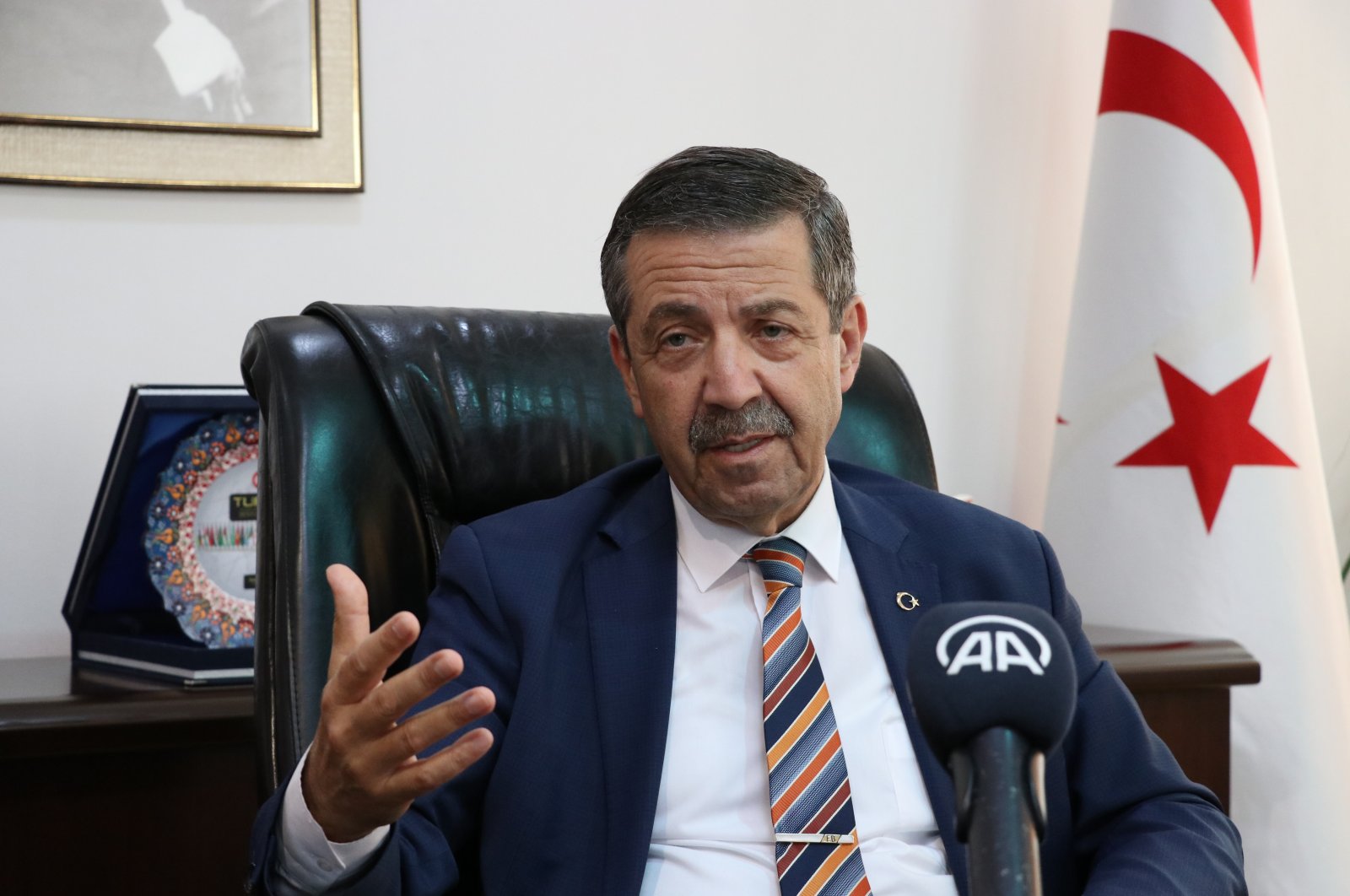 TRNC Foreign Minister Tahsin Ertuğruloğlu speaks in an interview, May, 26, 2022. (AA Photo)