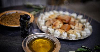 Olive oil and other local products displayed at "Kilis Cuisine from Oylum Höyük (mound) to the Present" event, Istanbul, Turkey, May 27, 2022. (Photo courtesy of Uğur Yıldırım)
