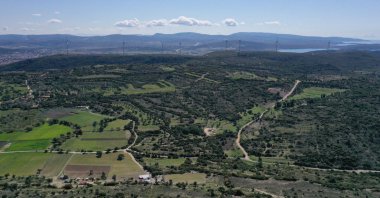 Wind turbines are seen in the Çeşme district of the Aegean province of Izmir, Turkey, April 20, 2022. (AA Photo)