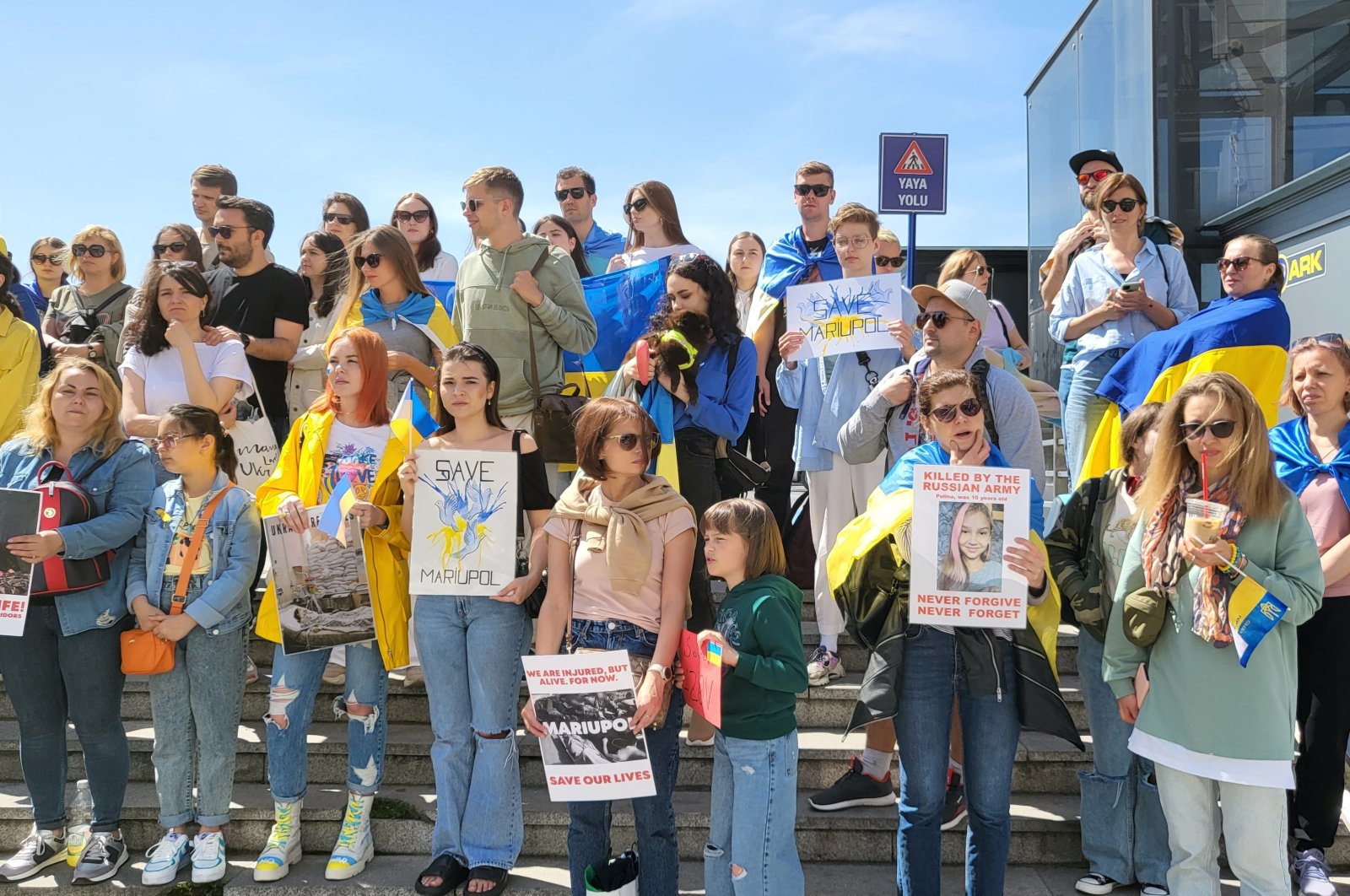 Ukrainian demonstrators holding banners protest the Ukraine-Russia war in Beyoğlu, Istanbul, Turkey, May 7, 2022. (İHA Photo)