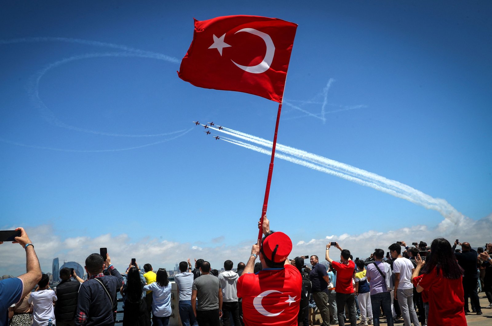 Turkish Air Forces Command fighter jets, the "Turkish Stars," perform creating the national flag&#039;s star and crescent during the opening ceremony of the aerospace and technology festival "Teknofest Azerbaijan" at Baku Crystal Hall, Baku, Azerbaijan, May 27, 2022. (AFP Photo)