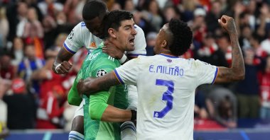 Real Madrid&#039;s goalkeeper Thibaut Courtois reacts after a save during the Champions League final soccer match between Liverpool and Real Madrid at the Stade de France in St. Denis near Paris, France, May 28, 2022. (AP Photo)