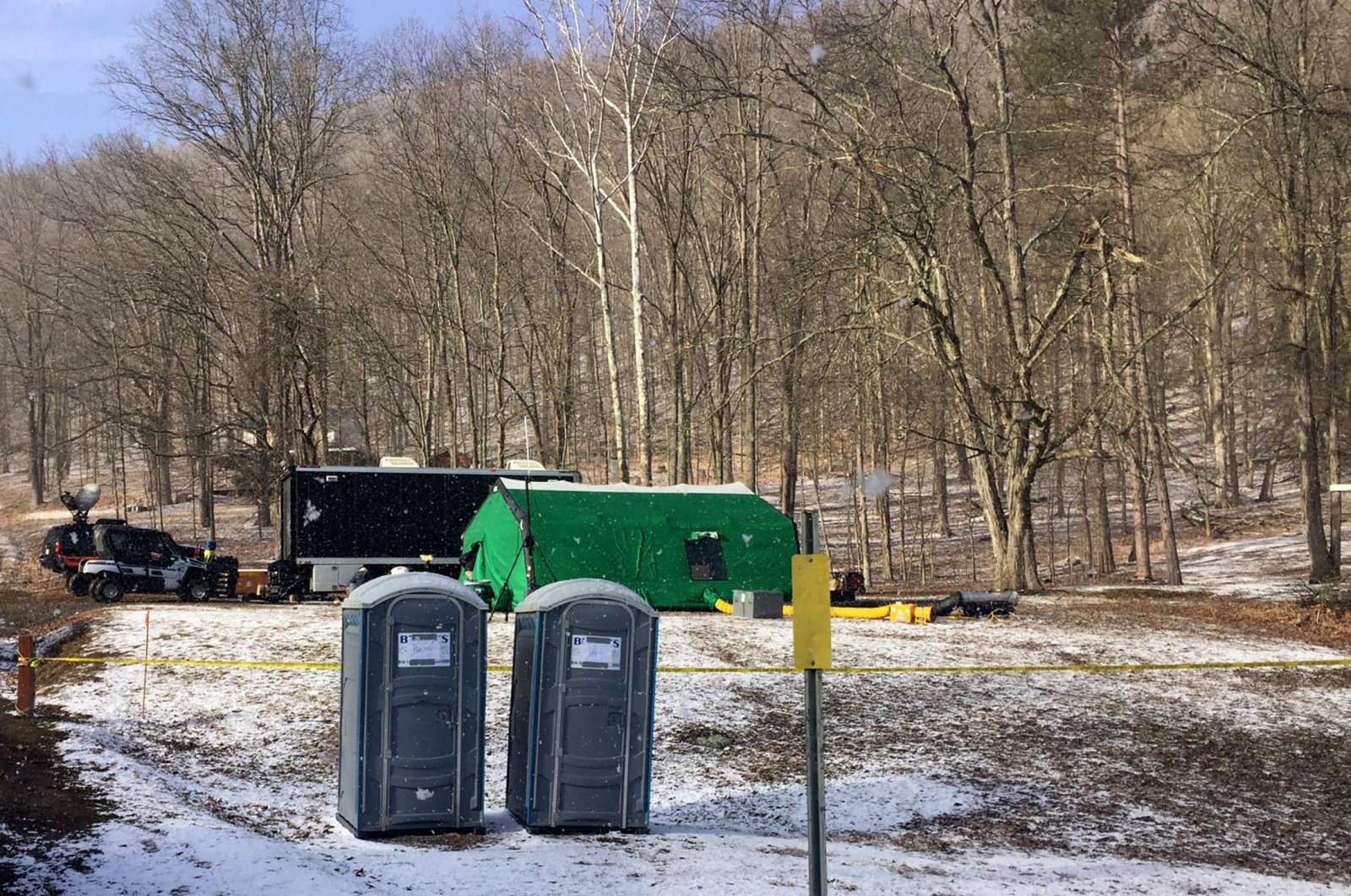 FBI agents and representatives of the Pennsylvania Department of Conservation and Natural Resources set up a base, in Benezette Township, Elk County, Pennsylvania, U.S., March, 2018. (AP Photo)