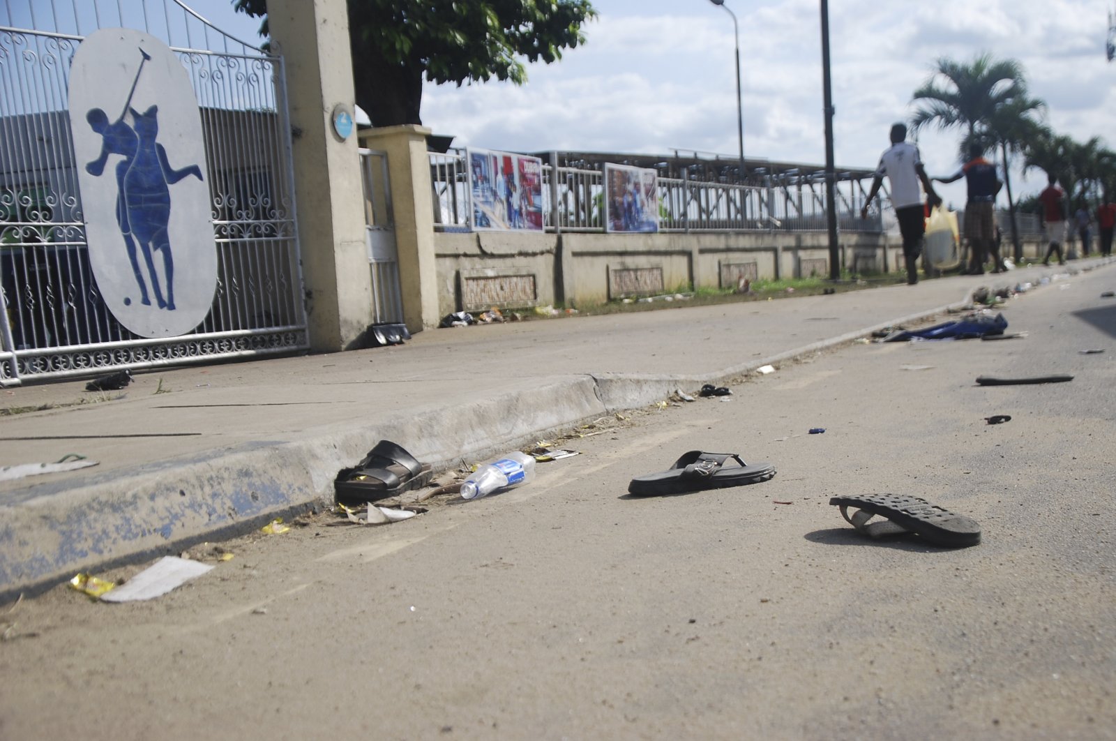 A view of flip fops and sandals on the street, following a stampede in Port Harcourt, Nigeria, May 28, 2022. (AP Photo)