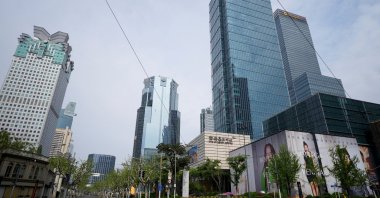 An empty road is seen in the Shanghai Central Business District (CBD) during a lockdown, amid the coronavirus pandemic, in Shanghai, China, April 16, 2022. (Reuters Photo)