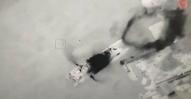 An aerial view shows a Ukrainian UAV Bayraktar hitting a Russian landing craft vessel with missiles, at Zmiinyi (Snake) Island, Ukraine, May 7, 2022. (Ukrainian Ground Forces via Reuters)