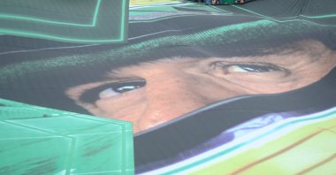 Fans of Ayrton Senna with a flag of the three times F1 World Champion, Sao Paulo, Brazil, Nov. 9, 2019.