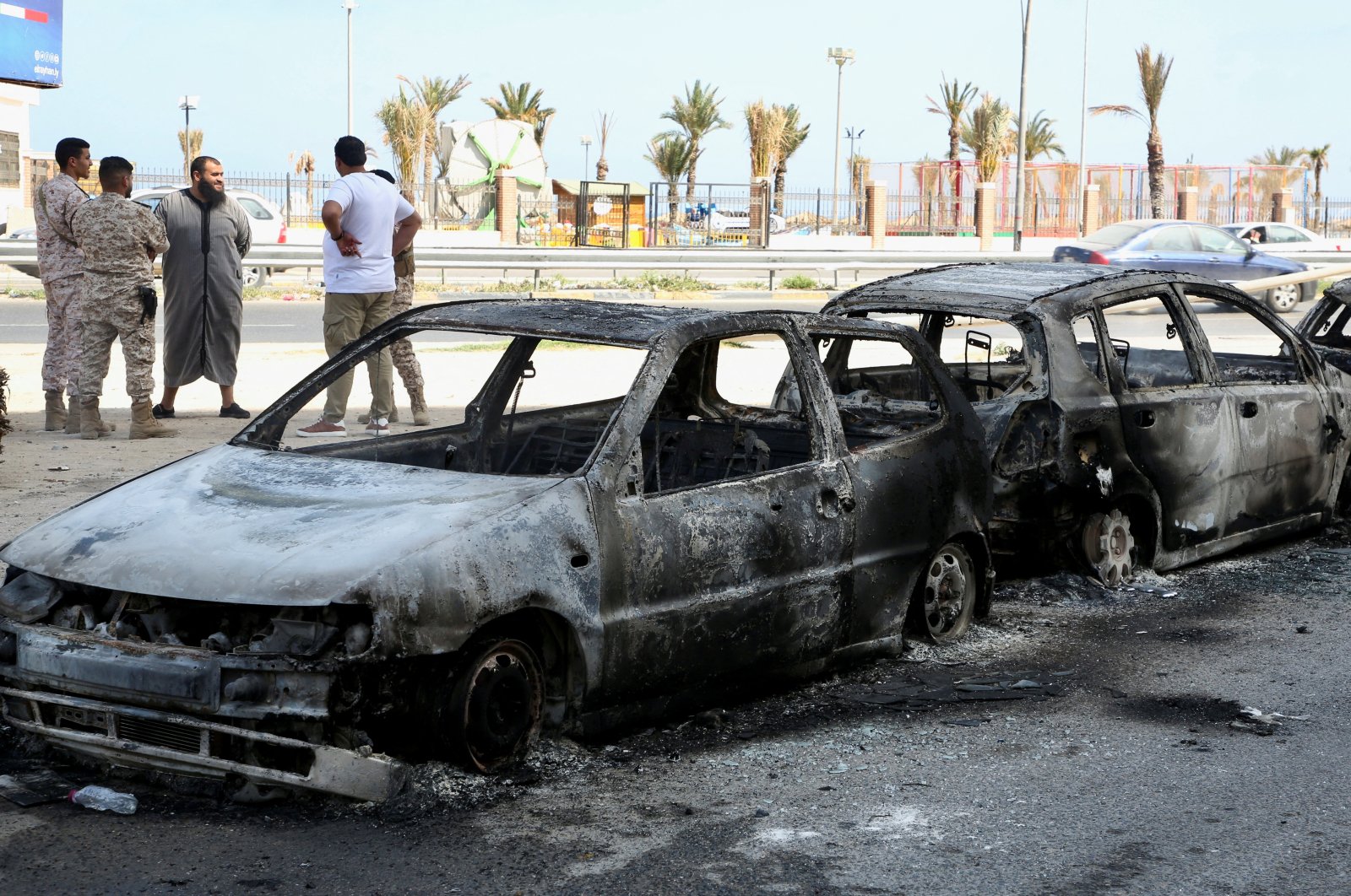 Vehicles destroyed after fighting between soldiers loyal to the head of Libya&#039;s Government of National Unity and rival forces, are seen in Tripoli, Libya, May 17, 2022. (Reuters Photo)