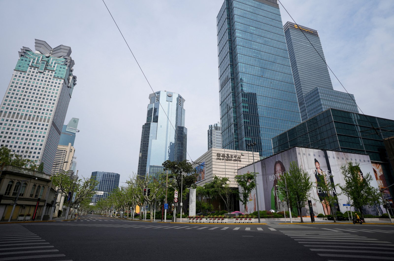 An empty road is seen in the Shanghai Central Business District (CBD) during a lockdown, amid the coronavirus pandemic, in Shanghai, China, April 16, 2022. (Reuters Photo)