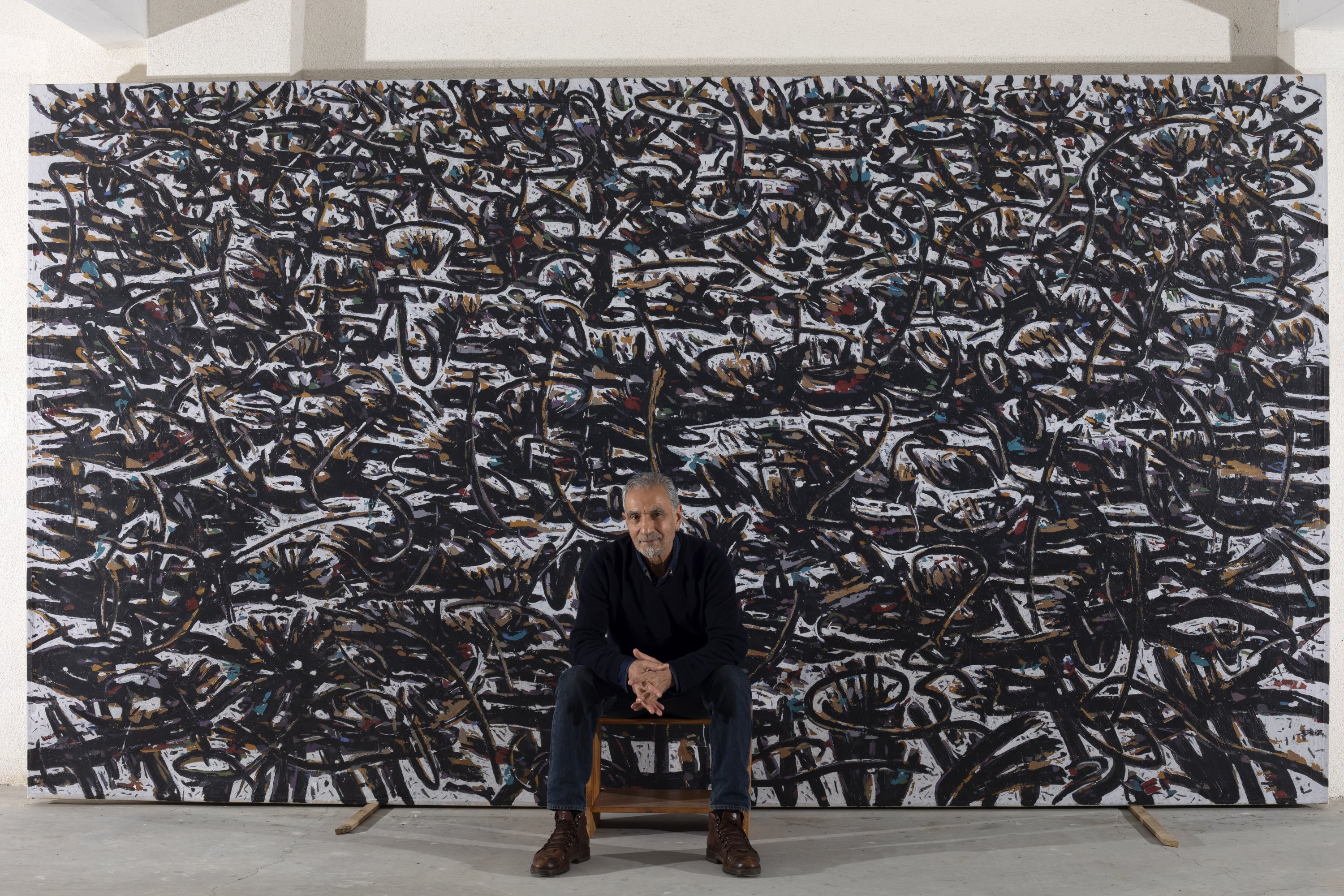 Mahmut Celayir poses with one of his works. (Courtesy of Istanbul Concept Gallery)