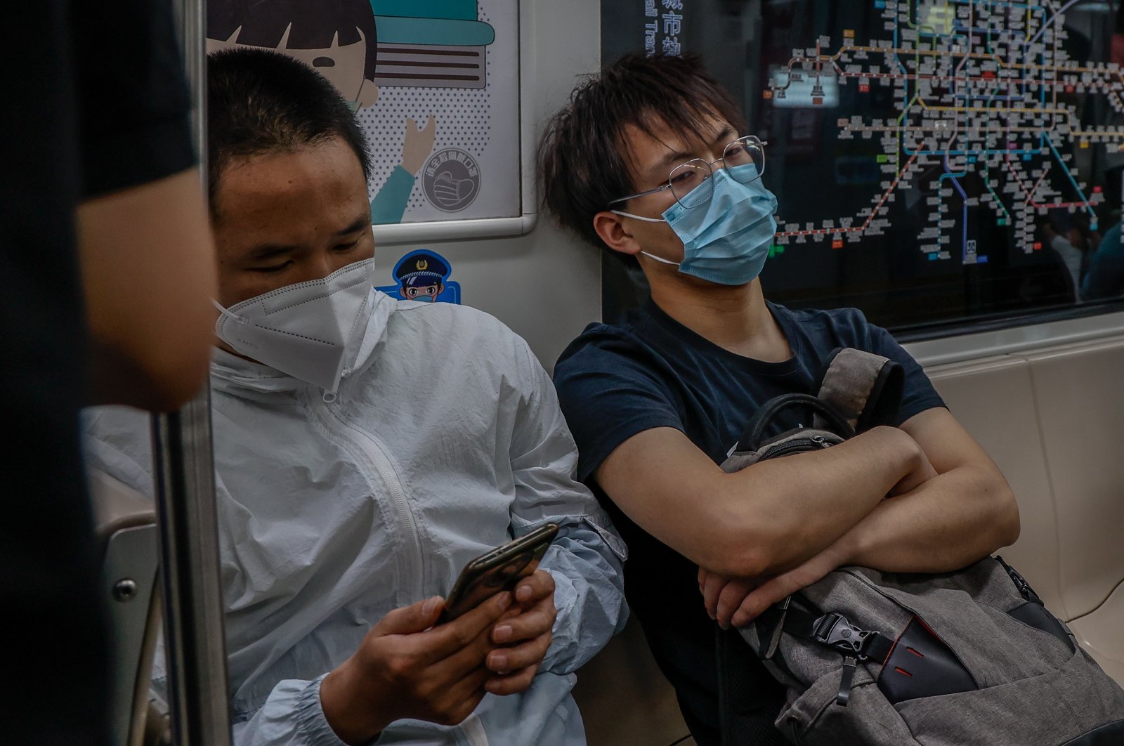 People ride a train in Beijing, China, May 30, 2022. (EPA Photo)
