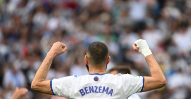 Real Madrid's French forward Karim Benzema celebrates after a La Liga match against Espanyol, Madrid, Spain, April 30, 2022. (AFP Photo)