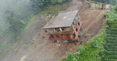 A view of a building that slid down the slope after a landslide, in Rize, northern Turkey, Aug. 14, 2021. (IHA PHOTO)