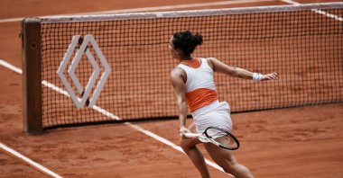 Martina Trevisan runs to play a shot against Leylah Fernandez, in Paris, France, May 31, 2022. (AP Photo)