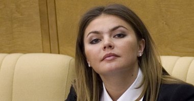 Former world gymnastics champion and then-member of the pro-Kremlin ruling United Russia party Alina Kabaeva listens during a parliament session in Moscow, Russia, Nov. 21, 2008. (AP Photo)